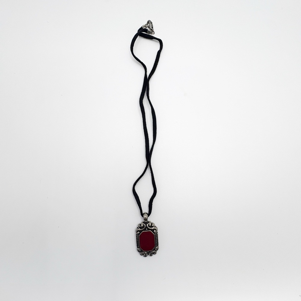Red and silver pendant necklace with black cord
